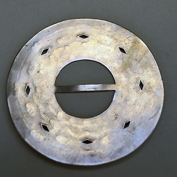 Scarf Slide- 2.5" Circular with hand‑stamped scallops and diamond cutouts. Smooth angled opening for easy glide; perfect for regalia and neckwear. Pictured here is the back.