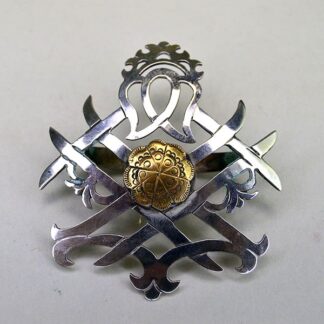 Scarf Slide- Double Strawberry with hand stapled brass concho, maker’s mark, and smooth soldered loop. Compact 2.5″ x 2.75″.