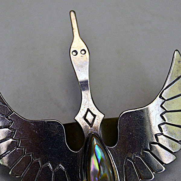 German silver Scarf Slide- Waterbird Abalone Gem, stamped, RI on the back and sized 3.5″ × 2.5″. Great for securing scarves, bandanas, or neckerchiefs. The head of the waterbird with the stamp work.
