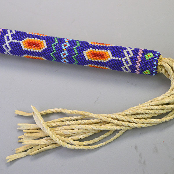 Fan Loose Pheasant Feathers with beaded handle handle and fringe detail