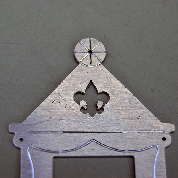 Scarf Slide Engraved Aluminum with cutout Fleur de Lis top detail