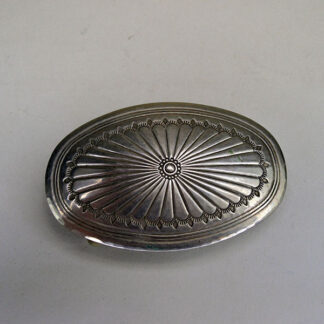 Vintage oval Belt Buckle- Hand Stamped details and a base‑metal finish. The TR/78 mark adds authentic 1970s character for collectors and everyday wear.