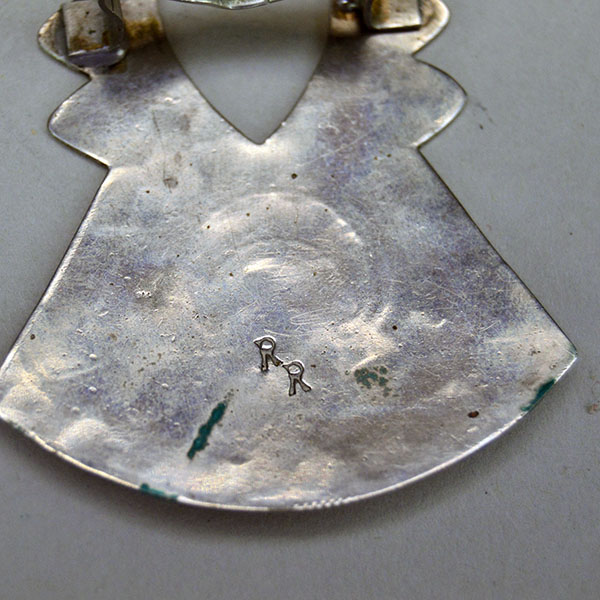 German silver Scarf Slide- Cross & Moon and heart cutout, finished with stamped designs and maker’s mark RR. Measures 3 inches by .75 inches. pictured here is the makers mark on the back RR.