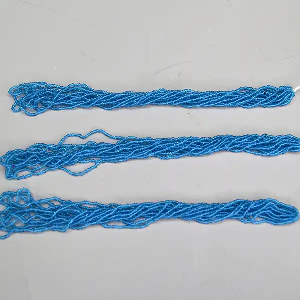 Add rich color to your beadwork with Antique 14/0 Trans Dark Medium Blue Blue Seed Beads. Available in limited quantities. Pictured here is a photo a little future back showing the beautiful color.