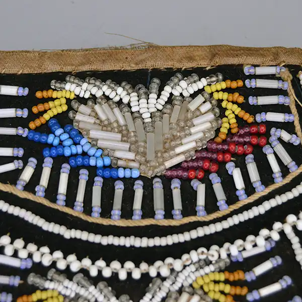 Antique Bag- Beaded Iroquois Style velvet bag with heart designs, pony‑bead edging, and worn bias tape. Approx. 5.25″ × 5.75″. One of a Kind. The beaded flap.