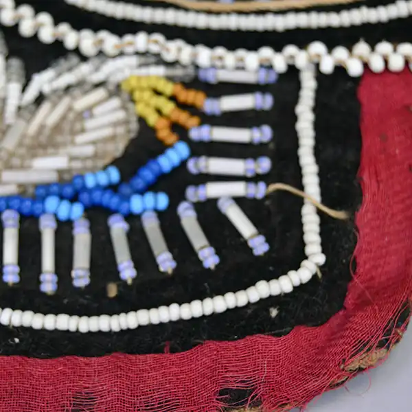 Antique Bag- Beaded Iroquois Style velvet bag with heart designs, pony‑bead edging, and worn bias tape. Approx. 5.25″ × 5.75″. One of a Kind. Showing the bias tape and some of it missing.