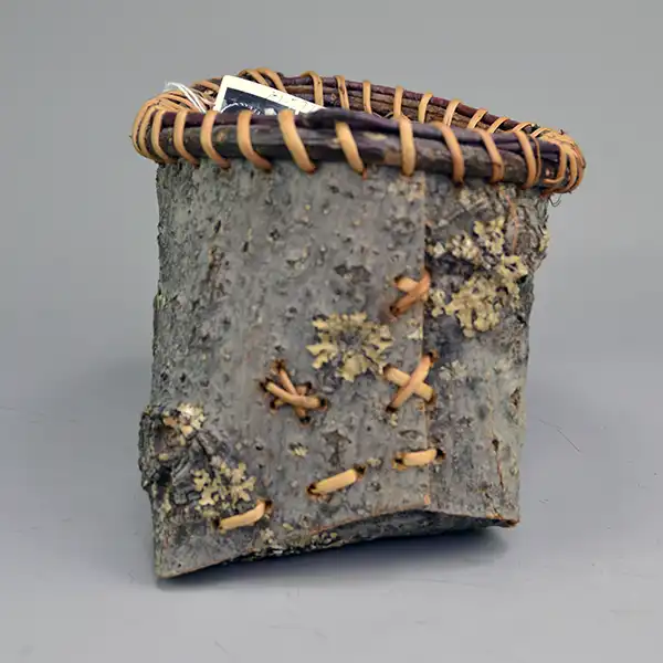 Basket- Ash Bark with spruce‑root stitching and Jennifer Lee’s signature—perfect for your collection. Approx. 7.5″ by 4.5″ One of a Kind. The other side.