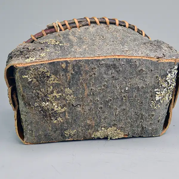 Basket- Ash Bark with spruce‑root stitching and Jennifer Lee’s signature—perfect for your collection. Approx. 7.5″ by 4.5″ One of a Kind. The bottom.