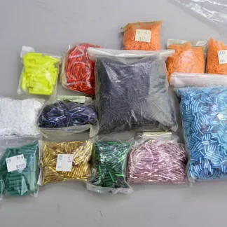 Stock up on Bead Lot- Bugle Assorted in a 26 oz package. Perfect for fringe, jewelry, and detailed beadwork with colorful twisted accents.