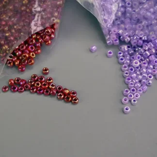 Create stunning beadwork with this 2-pound lot of Bead Lot- Luster Finish seed beads. Features a colorful mix of purple and red with beautiful shine.