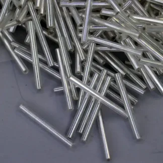 Bead Lot- Silver Lined Clear bugle beads, 17 oz lot, 23mm long. Ideal for beaded fringe, jewelry making, beadwork, and detailed craft designs.