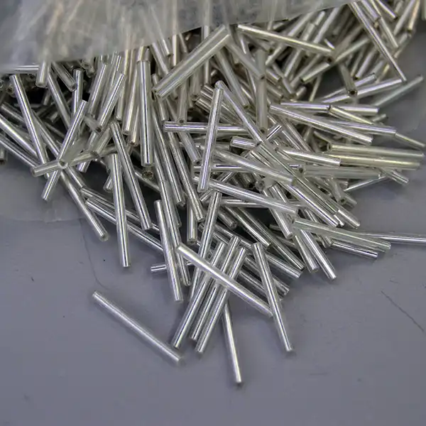 Bead Lot- Silver Lined Clear bugle beads, 17 oz lot, 23mm long. Ideal for beaded fringe, jewelry making, beadwork, and detailed craft designs. Here is a different angle to see the shine.