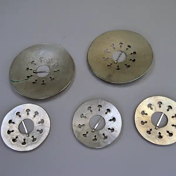 German silver Brooch- 5 piece Set with matching hand‑stamped designs in 2" and 3" sizes. A coordinated, artisan‑crafted collection for wear or display. The back of the brooches.
