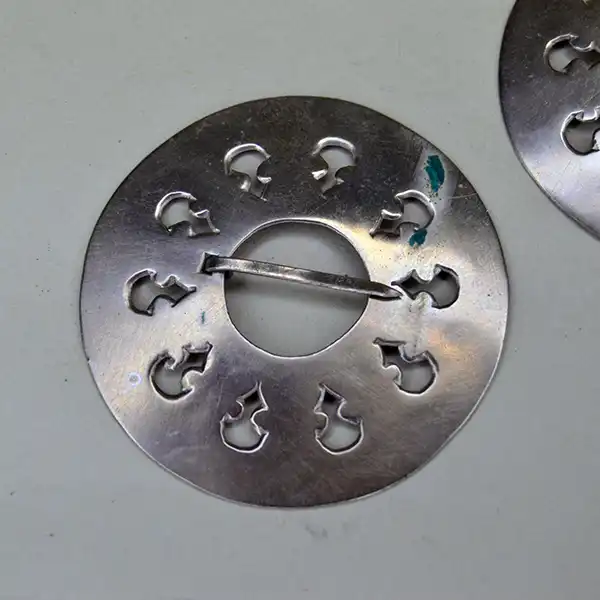 German silver Brooch- 5 piece Set with matching hand‑stamped designs in 2" and 3" sizes. A coordinated, artisan‑crafted collection for wear or display. pictured here is an up close of the hand stamped design.