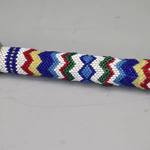 Handcrafted 18" Dance Stick- Otter Fur show cases vibrant peyote stitch beadwork, otter fur accents, and traditional craftsmanship for Powwow use. They peyote bead work design.