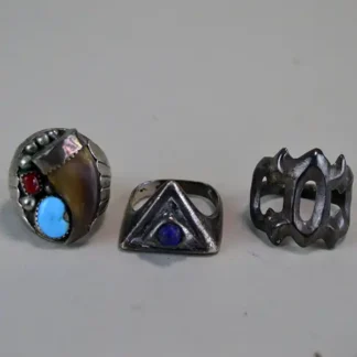 Silver Group Lot- 3 Rings in sizes 10–11, featuring mixed designs, bright stones, and a bear‑claw motif—great for everyday wear or regalia.