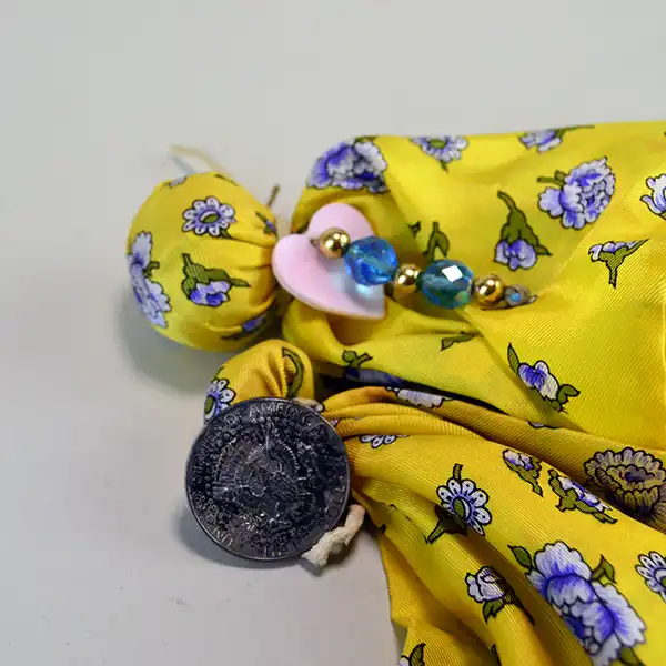 Scarves- Silk Yellow Floral with artisan beadwork, a pink concho heart, turquoise AB beads, and a vintage 1964 Half Dollar accent. One of a Kind. pictured here are the accents on the silk scarves.