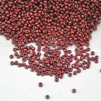 Add rich brown color to your beadwork with 1 kilo 12/0 Seed Beads- Dark Brown. Ideal for traditional regalia, rosettes, hair ties, and more.