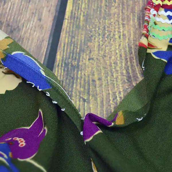 Vintage Skirt & Blouse- Seminole set with patchwork and geometric banding, rickrack trim, and classic strip‑piecing. One of a Kind. Pictured here is the back of the skirt.