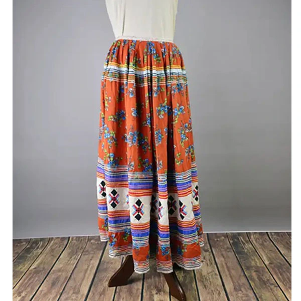 Vintage Skirt- Floral Seminole Style patchwork skirt with multicolor rickrack, bold piecework, and traditional craftsmanship; shows gentle wear.