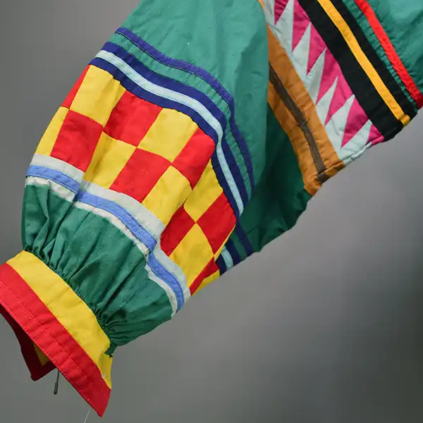 Old Style Green Seminole Jacket. Patchwork close up.