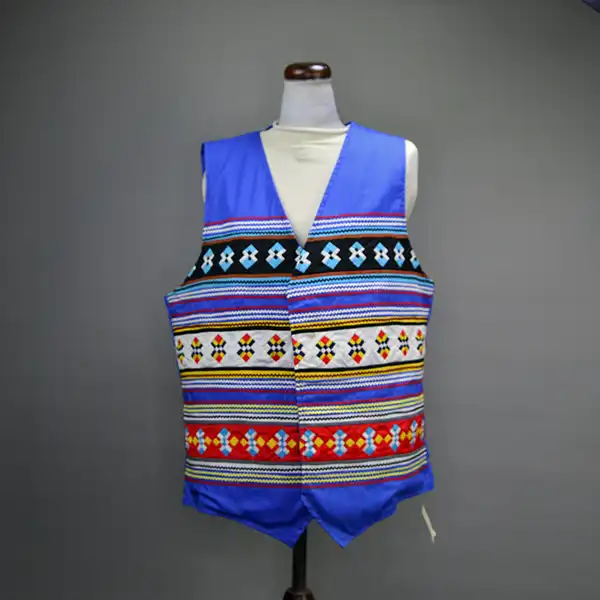 Seminole style vest royal blue with three rows of patchwork.