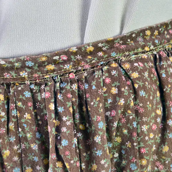 Vintage brown calico Seminole skirt waist close up